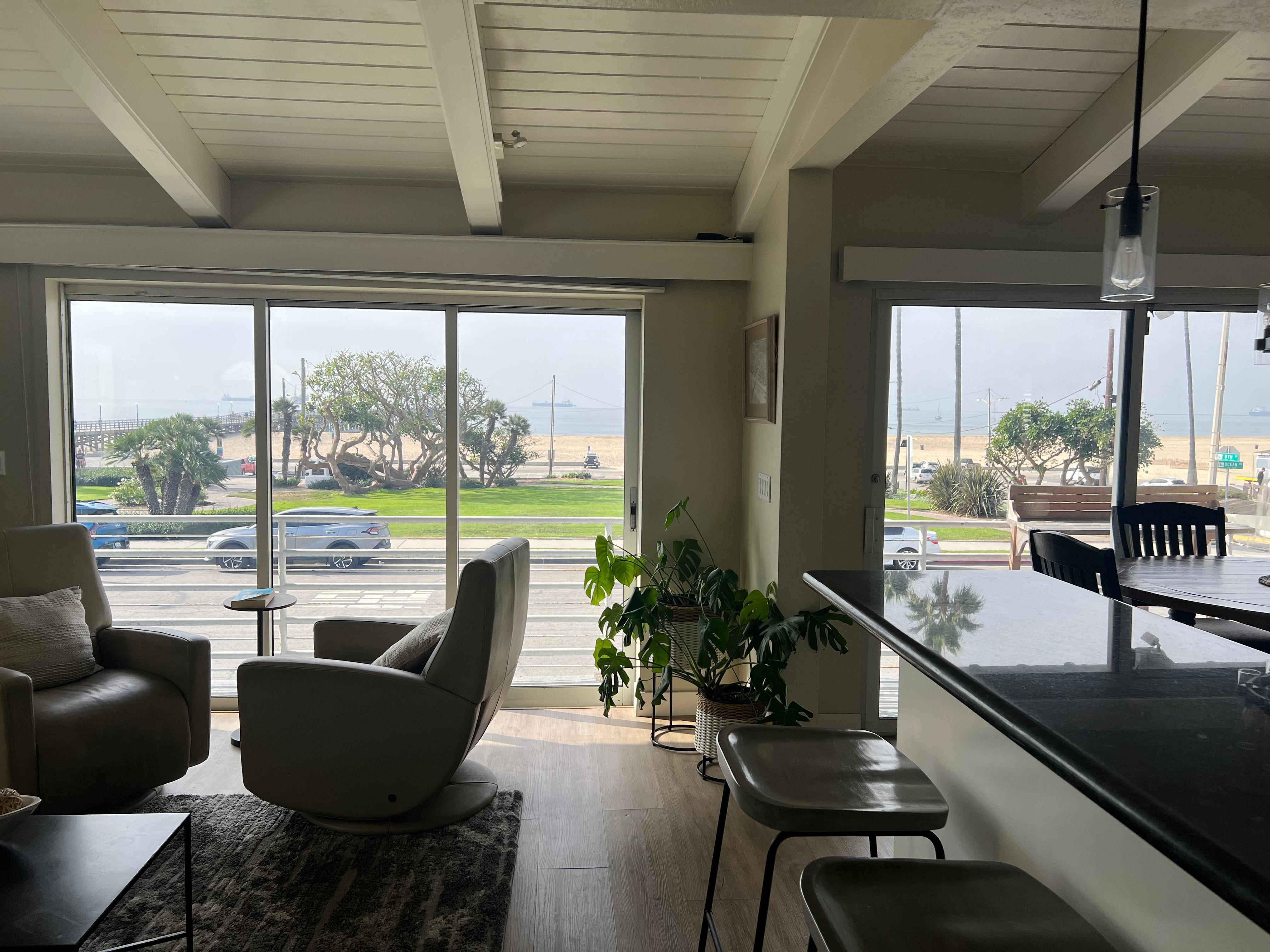 The doors on the left slide open completely for an open-air experience plus great views of Seal Beach Pier.