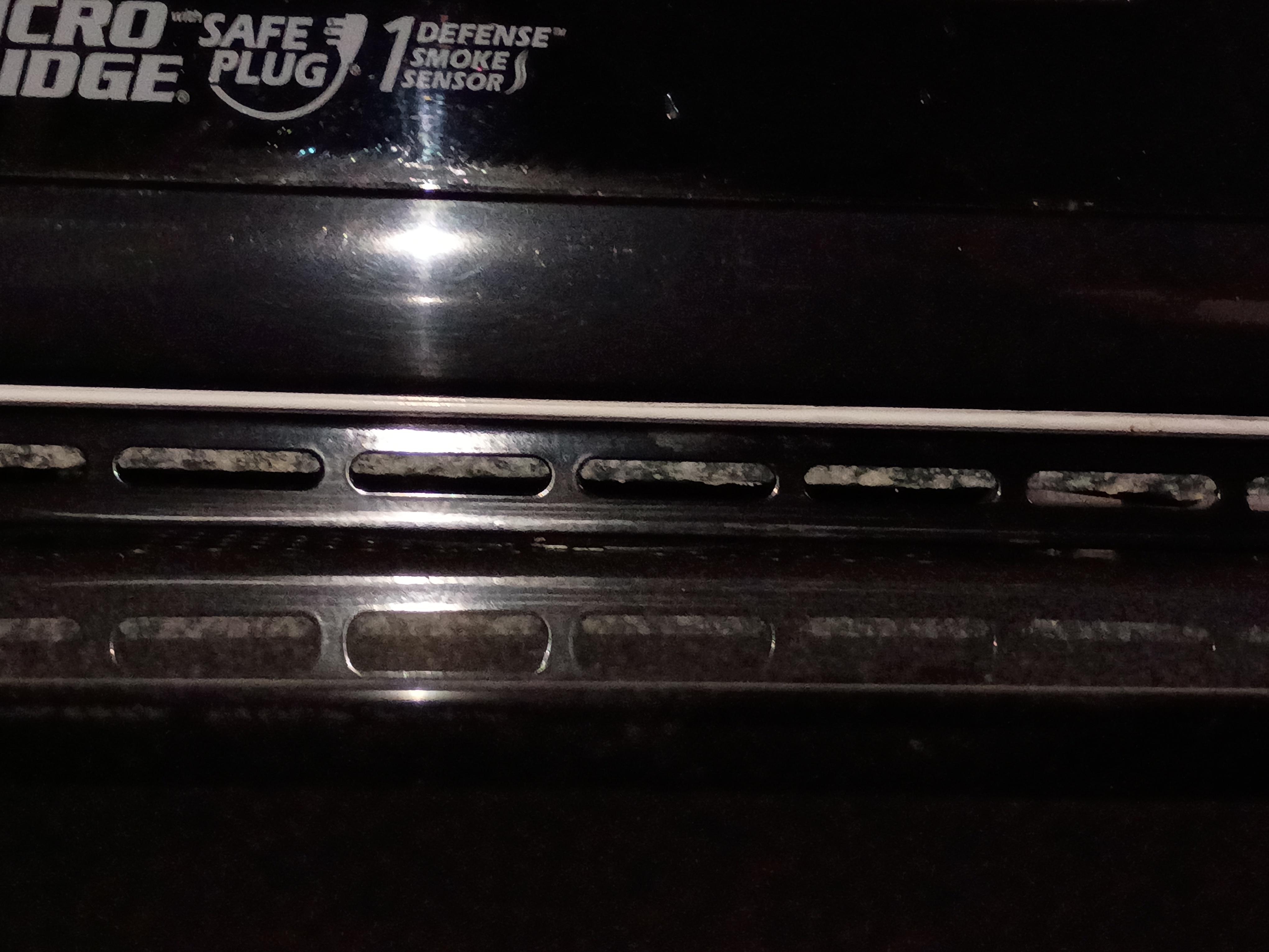 Dust and mold under the microwave 