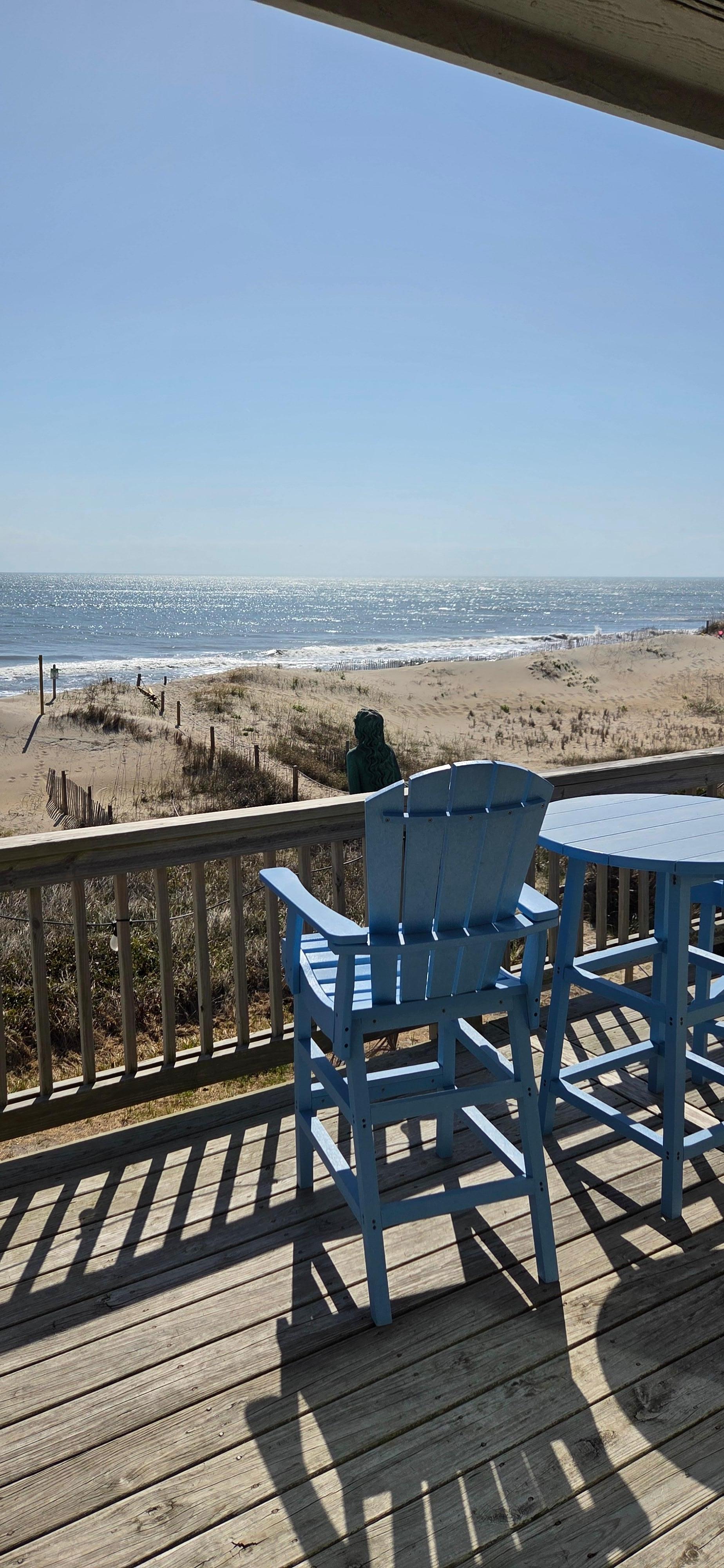 Relax on one of the decks and listen to the surf.