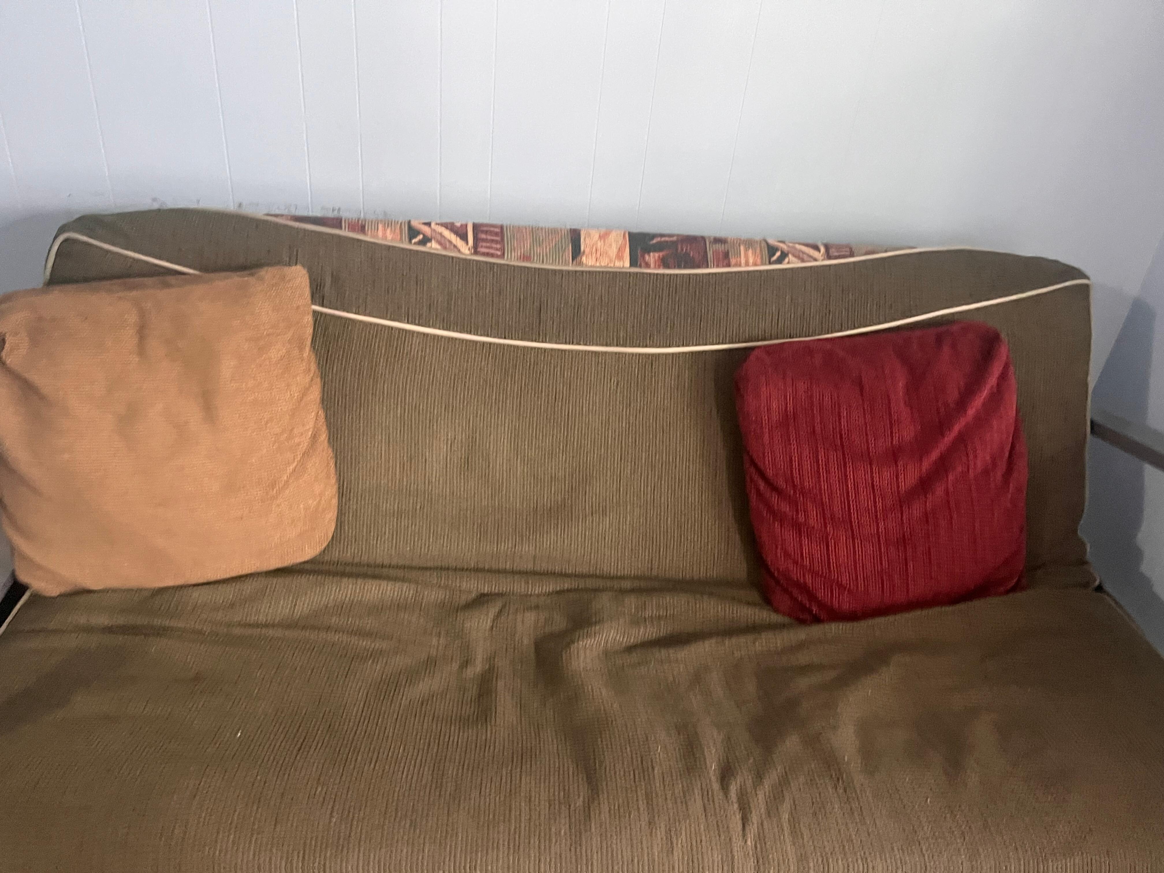 The food town which served at a couch was not comfy and could not be used as a bed as there were no sheets, blankets, or extra pillow