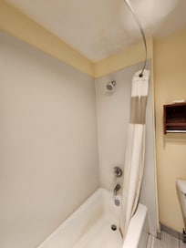 Stained shower that leaked. Very little water pressure