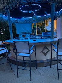 Tiki Hut at night.