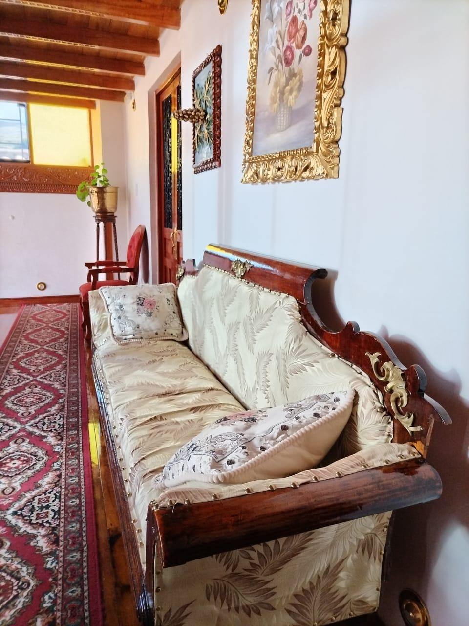 Sofa for sipping whiskey in the third-floor corridor.