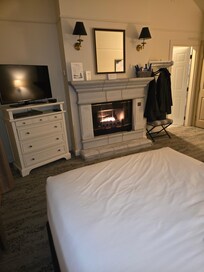 View of the fireplace in our room with 2 queen beds.