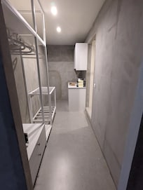 Closet and a doorway to the bathroom