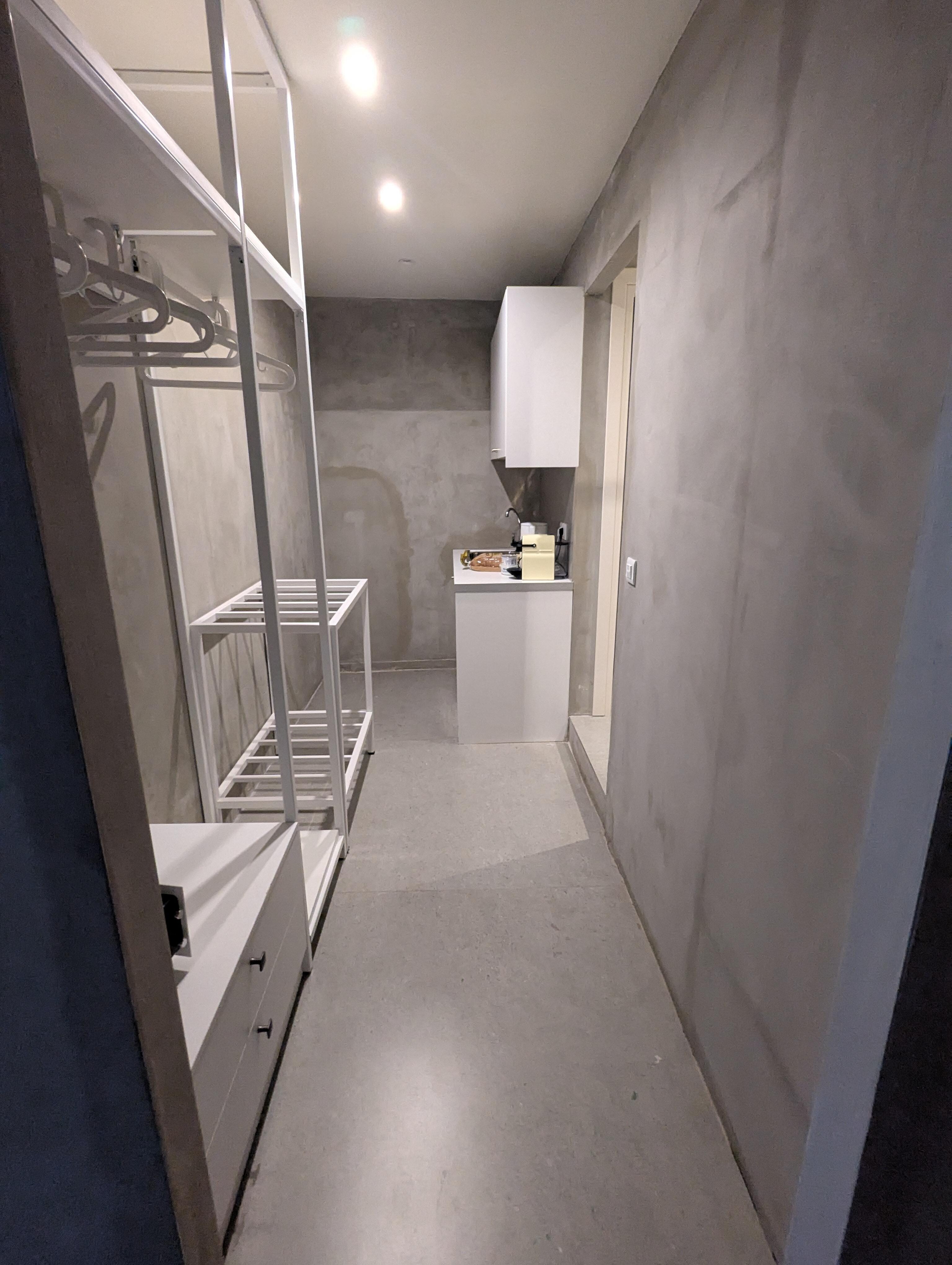 Closet and a doorway to the bathroom