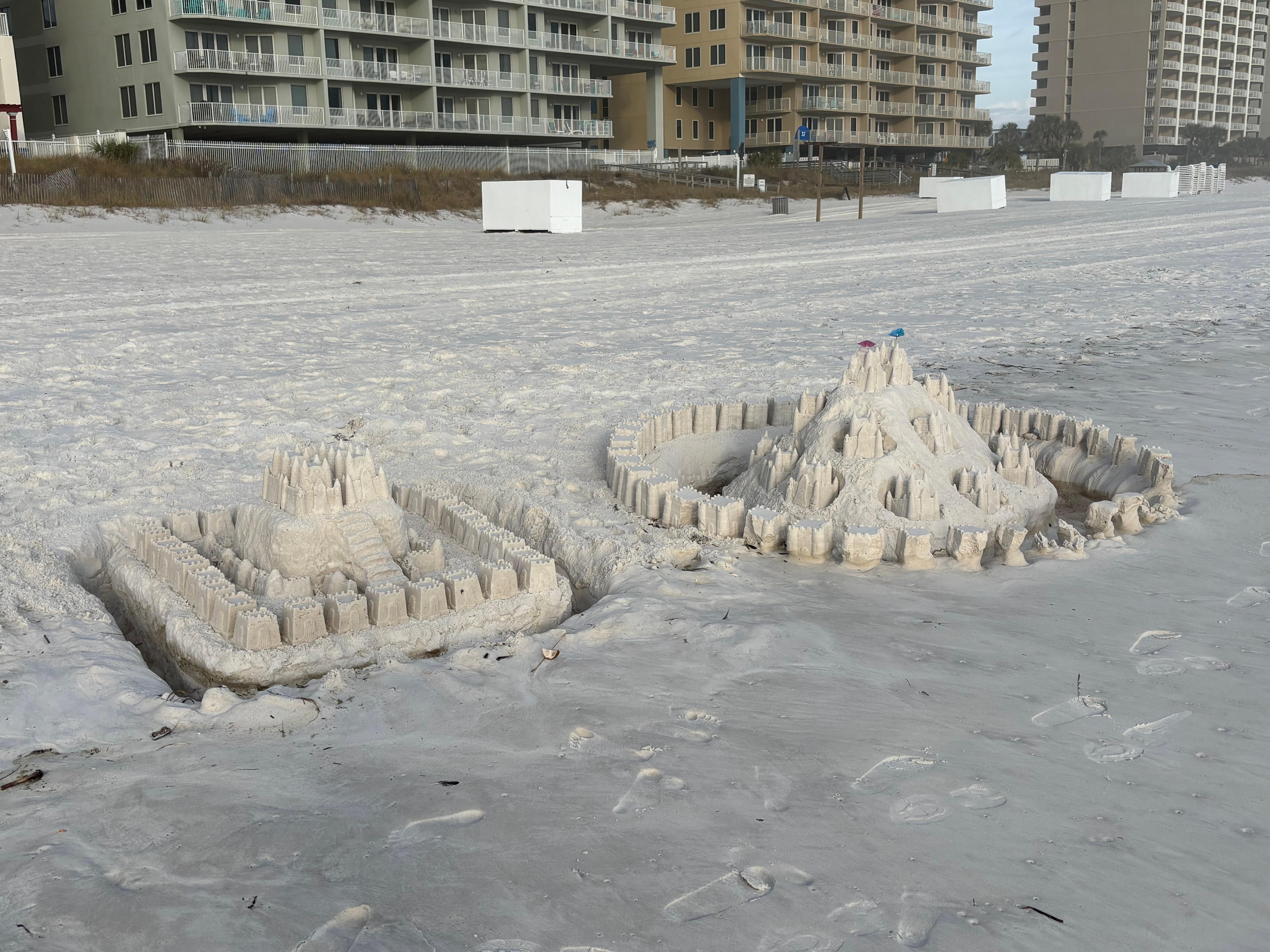 Sand castles on a beach walk 