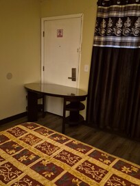 This was before I added the heavy chair to secure the door also. As you can see NO locks on the doorknob and lock on upper door had been removed.