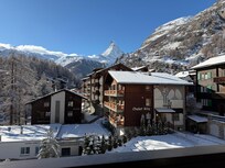 View from our room. Zoomed out to 0.5x. Matterhorn Mountain and surrounding town.