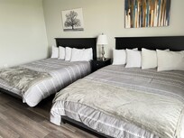 Comfy beds and sufficient amenities, the shower comes with a grab bar👍🏻