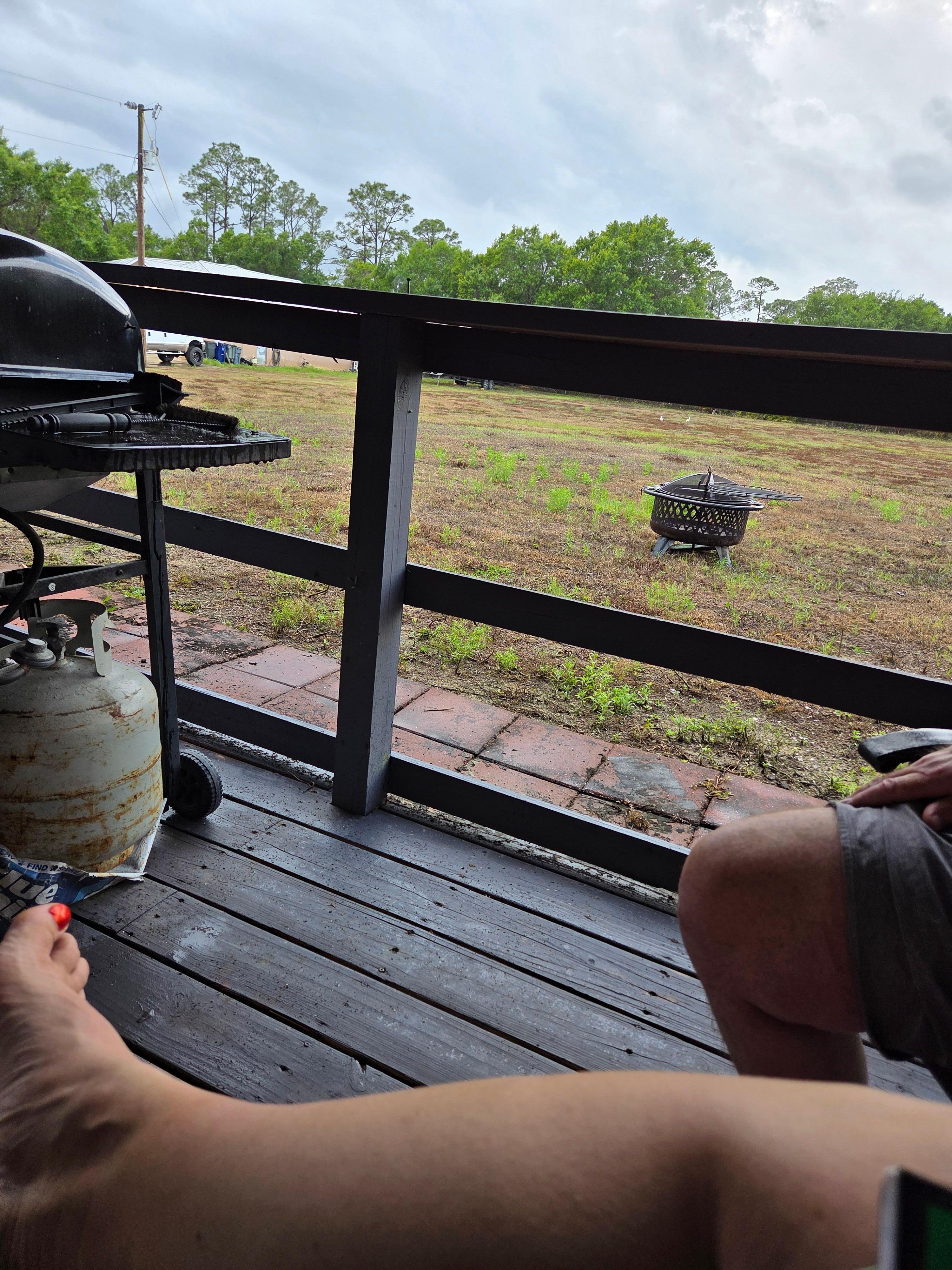 Back covered porch for dinner, or reading and relaxing. 