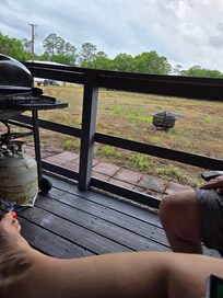 Back covered porch for dinner, or reading and relaxing.