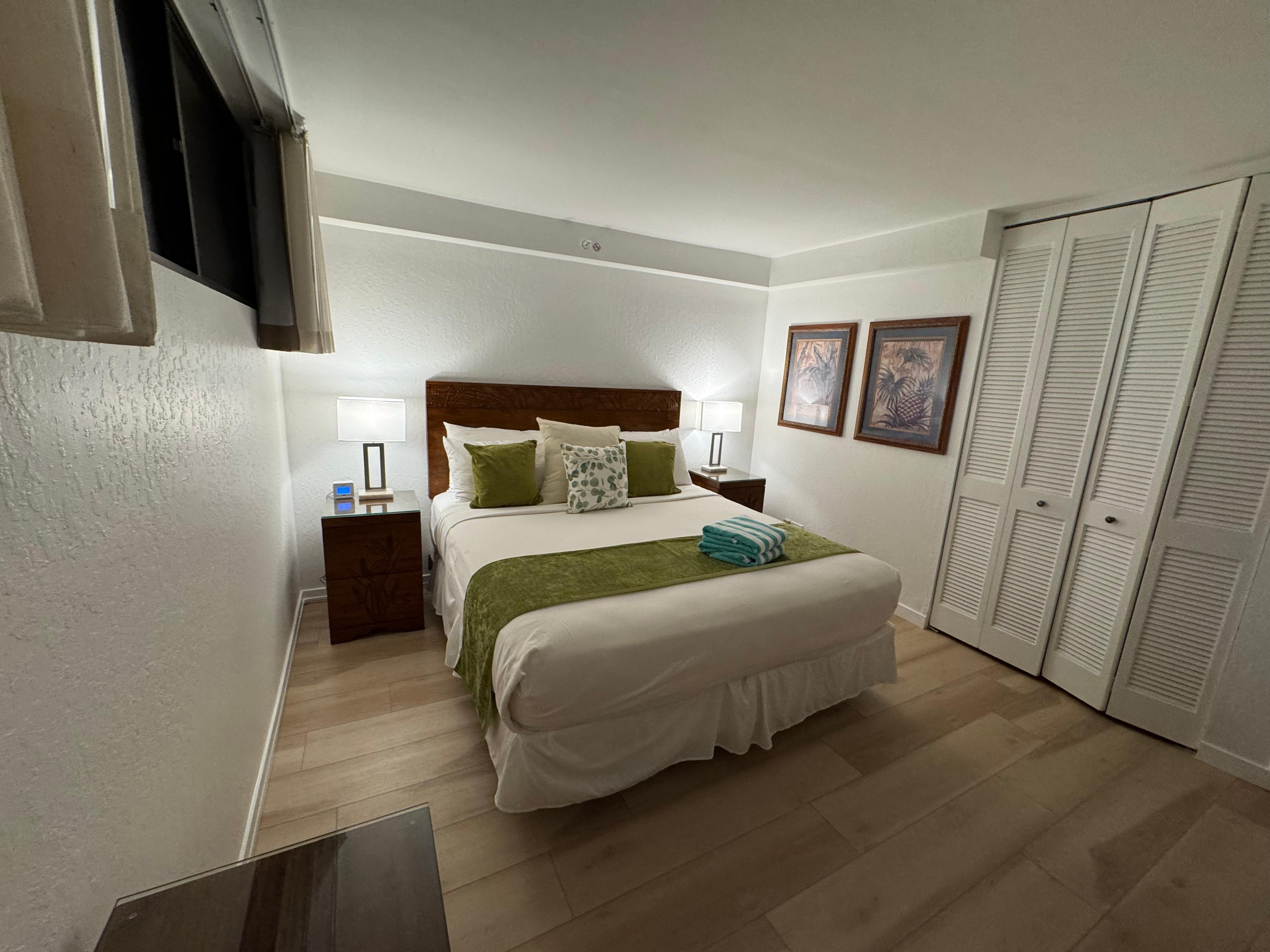 Primary bedroom has one regular dresser and two night stands with storage as well as a desk, chair and closet. 