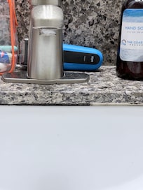 Bathroom sink(look at faucet end)