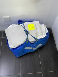This is the bag of replacement towels /linen that the next guest will enjoy. Note the delightful colour and quality!