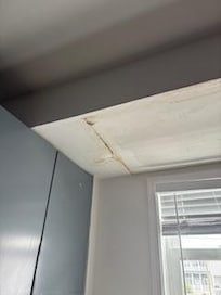 Active roof leak. Upon arrival stream of water dripping from ceiling and in bedroom closet.