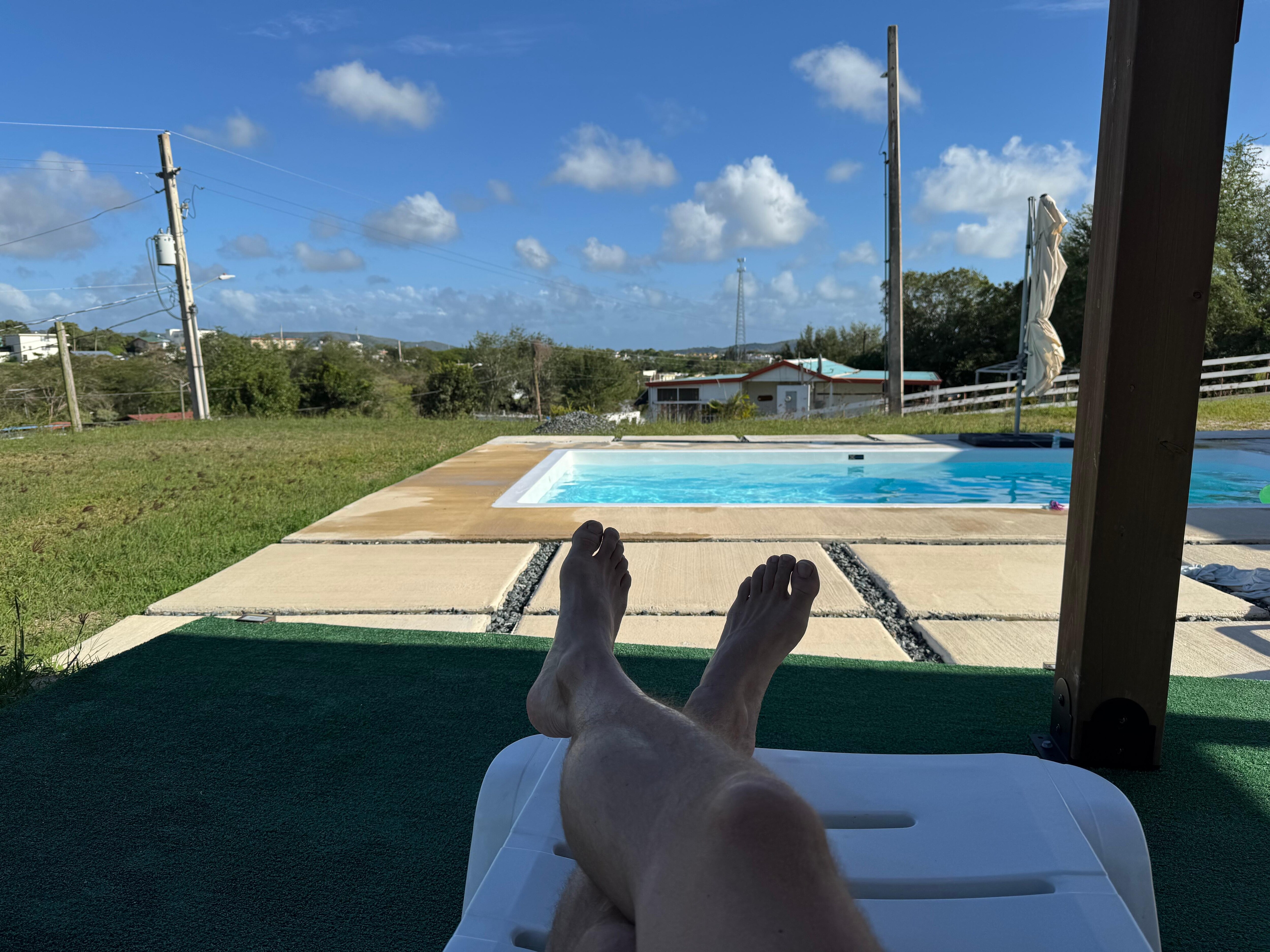 Chilling poolside and taking in the view
