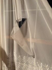 Turn dirty curtain in livingroom.