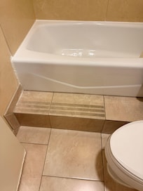 The bathroom you have to step up over and in. Very dangerous