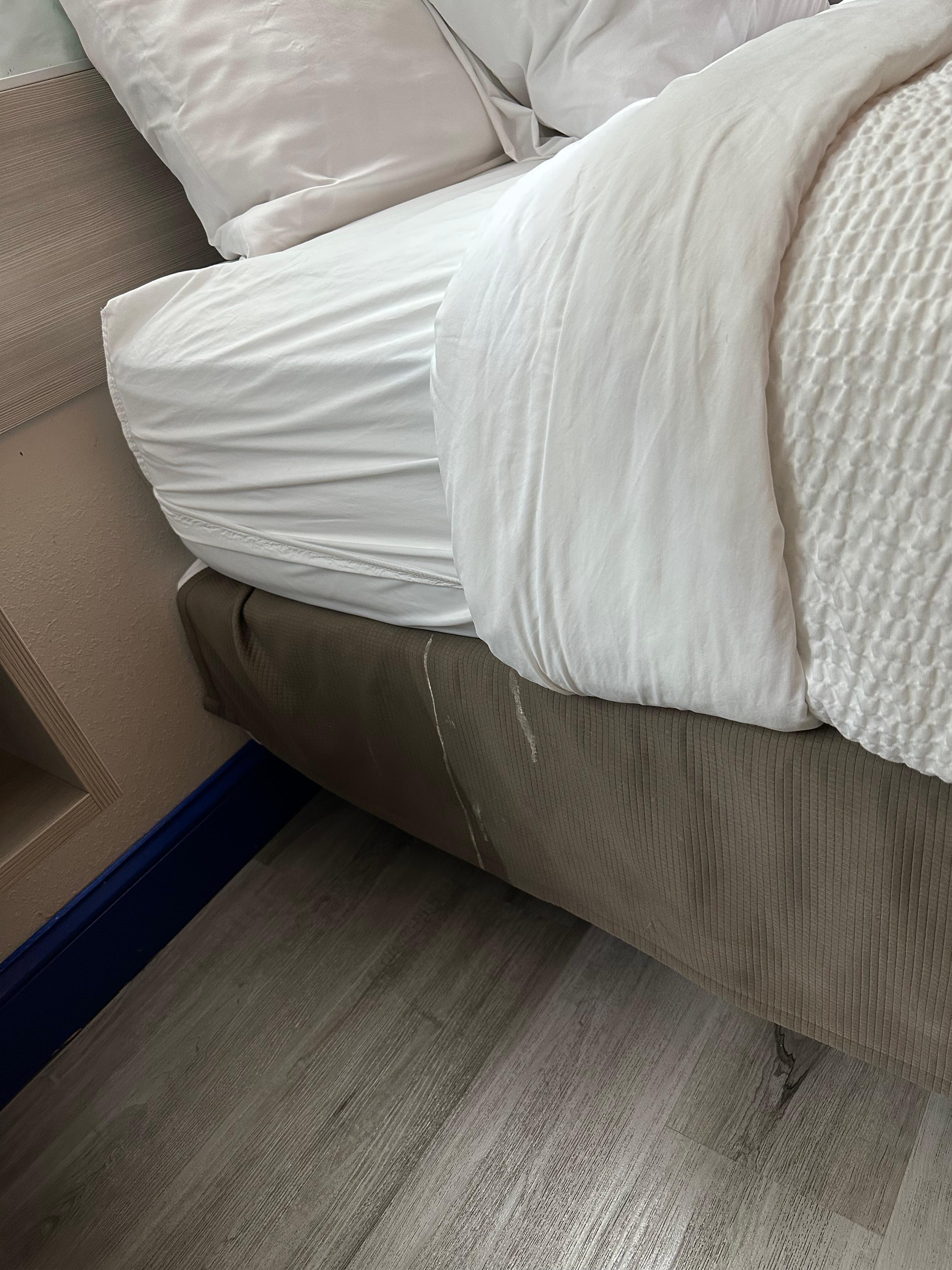 Stains (unknown) on bed skirt