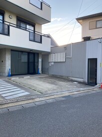 This is the outside of the apartment. It is the first floor on the right. It must have been an office originally.