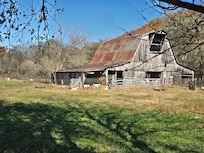 Attached farm with goats.