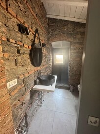 This was my favourite bathroom. It's very clean and modern but the rustic elements were incredible