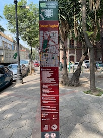 Small park a block away from Hotel Kali Ciudadela has reference to many museums