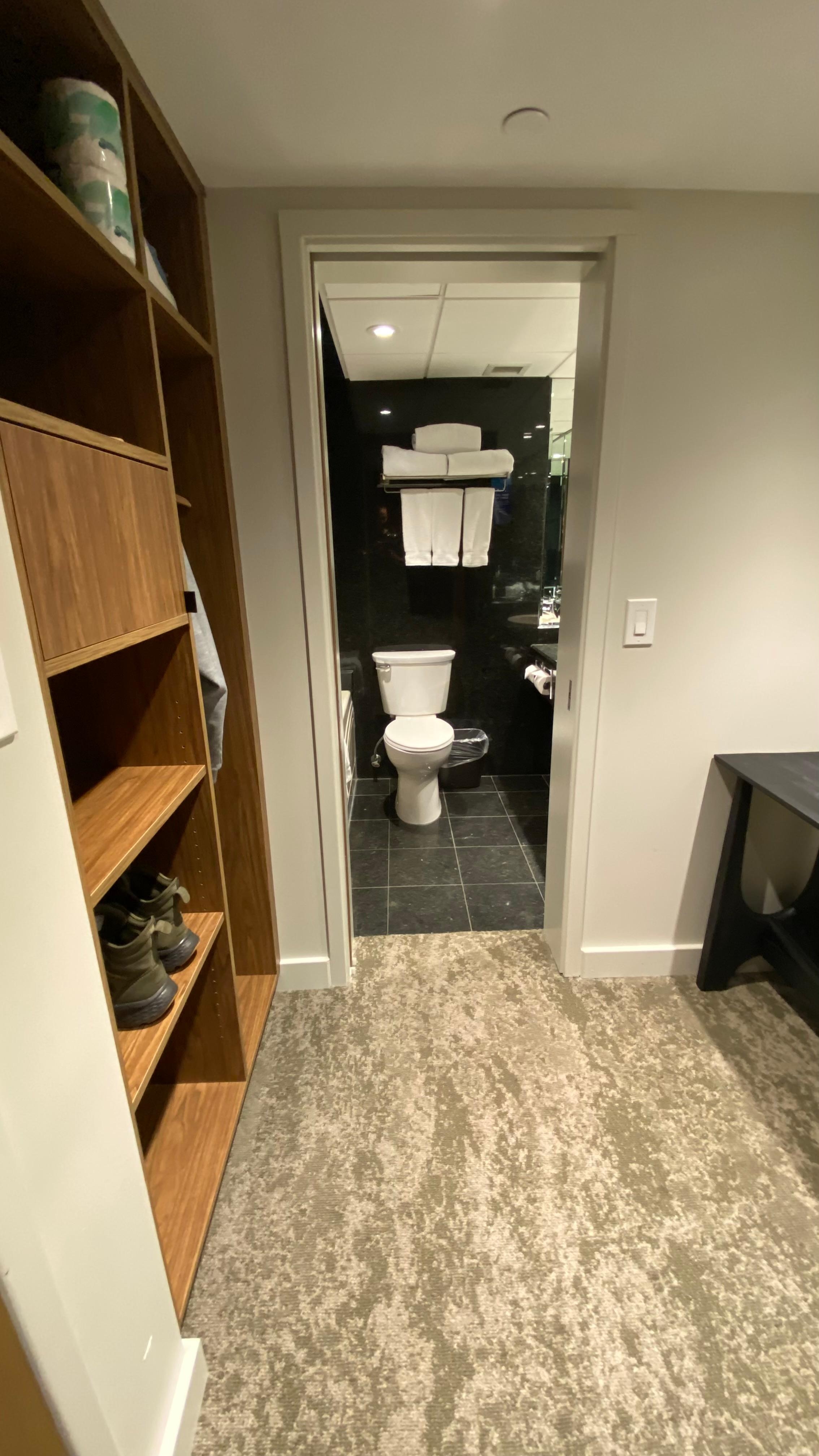 There was a safe in the brown cupboards on the left and two bathroom