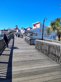 The Boardwalk at John's Pass is just a short walk across the street. Lots of great shops and restaurants there.