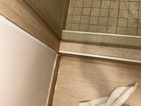 Bathroom floods when shower is used - clearly a regular problem from all the water damage present