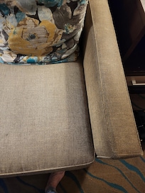 Sofa arms dirty & old.