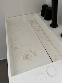Hair and stains in the sink