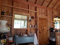 Dining table with extenders near front entrance