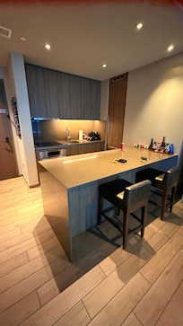 Modern kitchen with coffee and wet bar