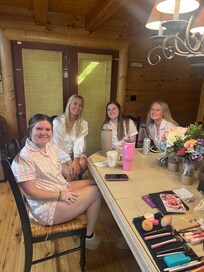 All the beautiful bridesmaids waiting for hair and makeup on the main level.