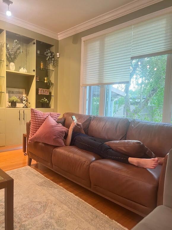 The living room is so comfortable and nicely decorated, perfect for relaxing in after a busy day.