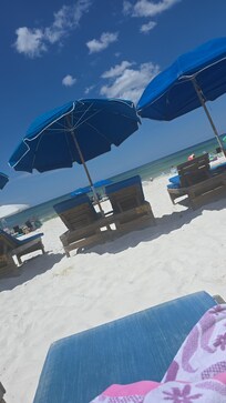 2 chairs come with the booking! Definitely a plus! It was so hot and the shade was handy!