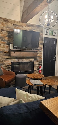 Beautiful stone work on fireplace. Great for cozy nights.