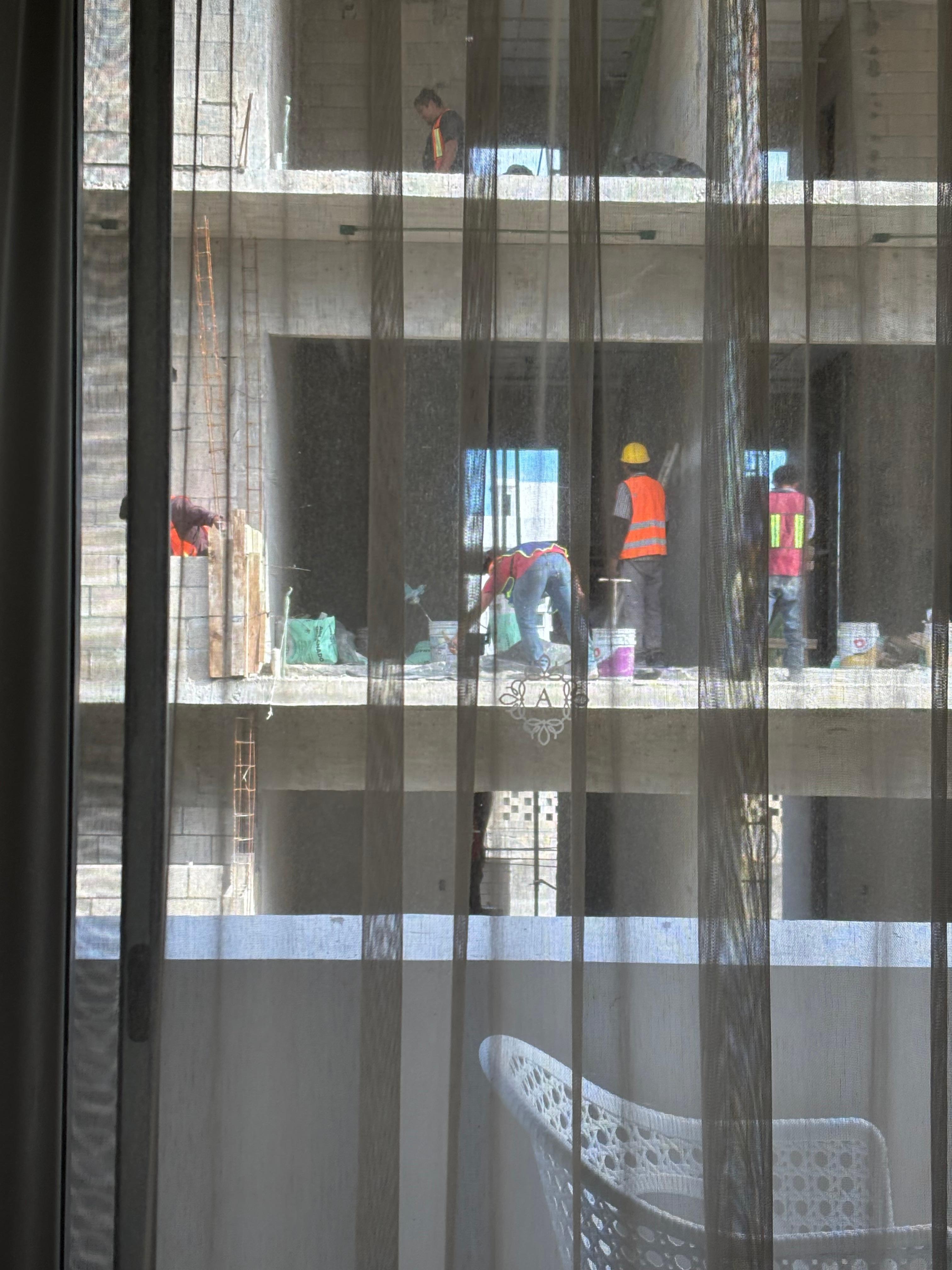 Taken from our bedroom window. They were there from 6 AM till at least five every day.