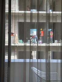 Taken from our bedroom window. They were there from 6 AM till at least five every day.