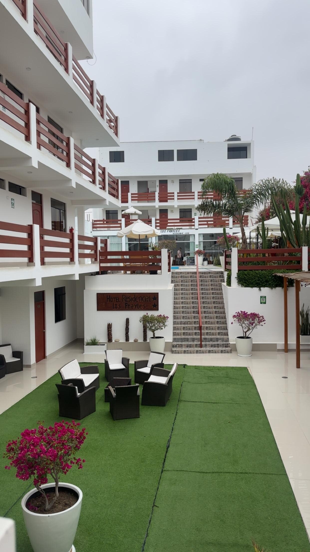 Outdoor area, pool situated up the stairs