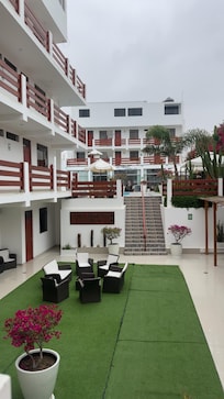 Outdoor area, pool situated up the stairs