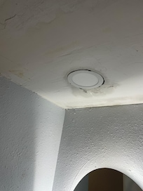 Recessed light leaking from the ceiling in the bathroom