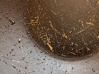 Non-stick Wok chipped and base layer exposed