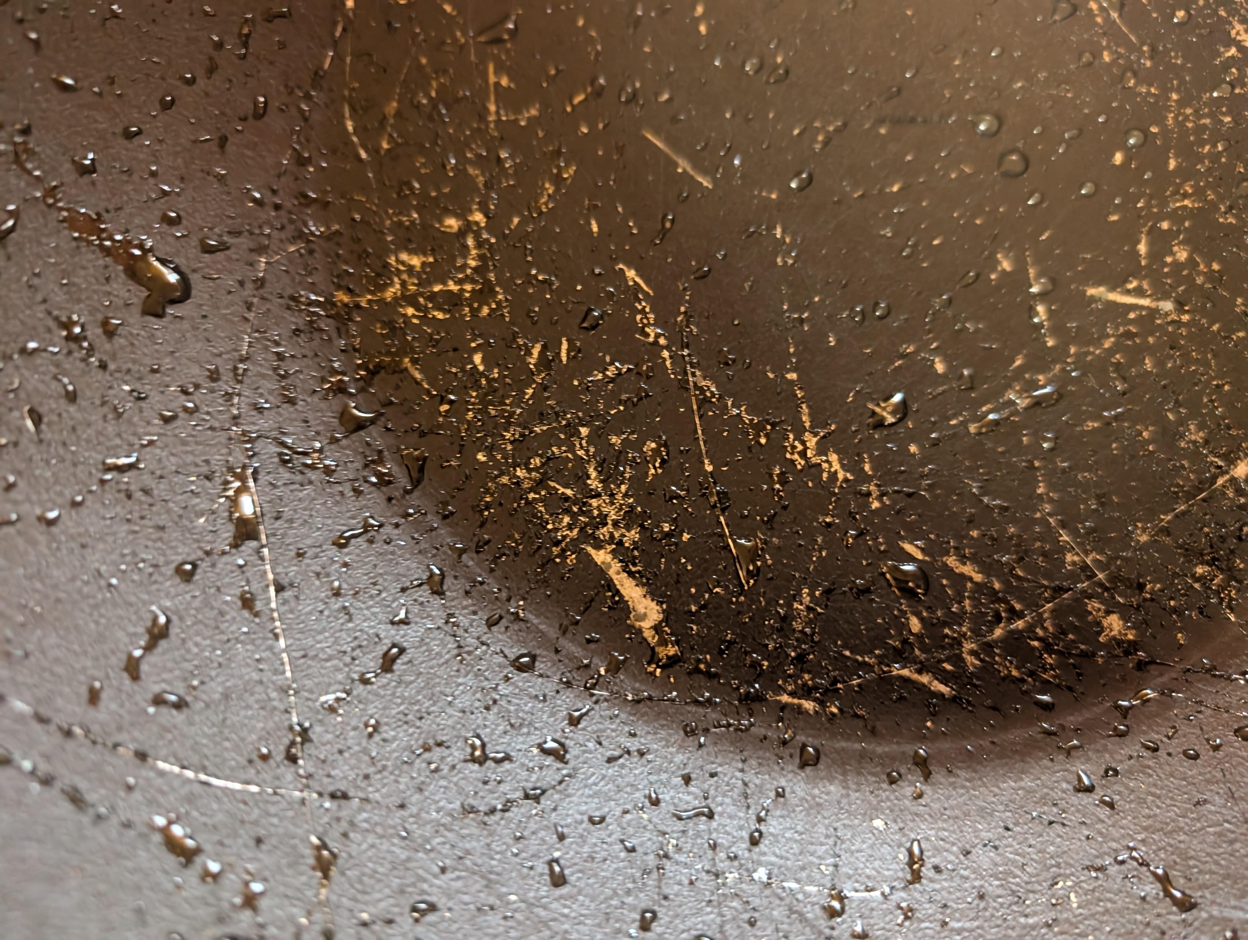 Non-stick Wok chipped and base layer exposed
