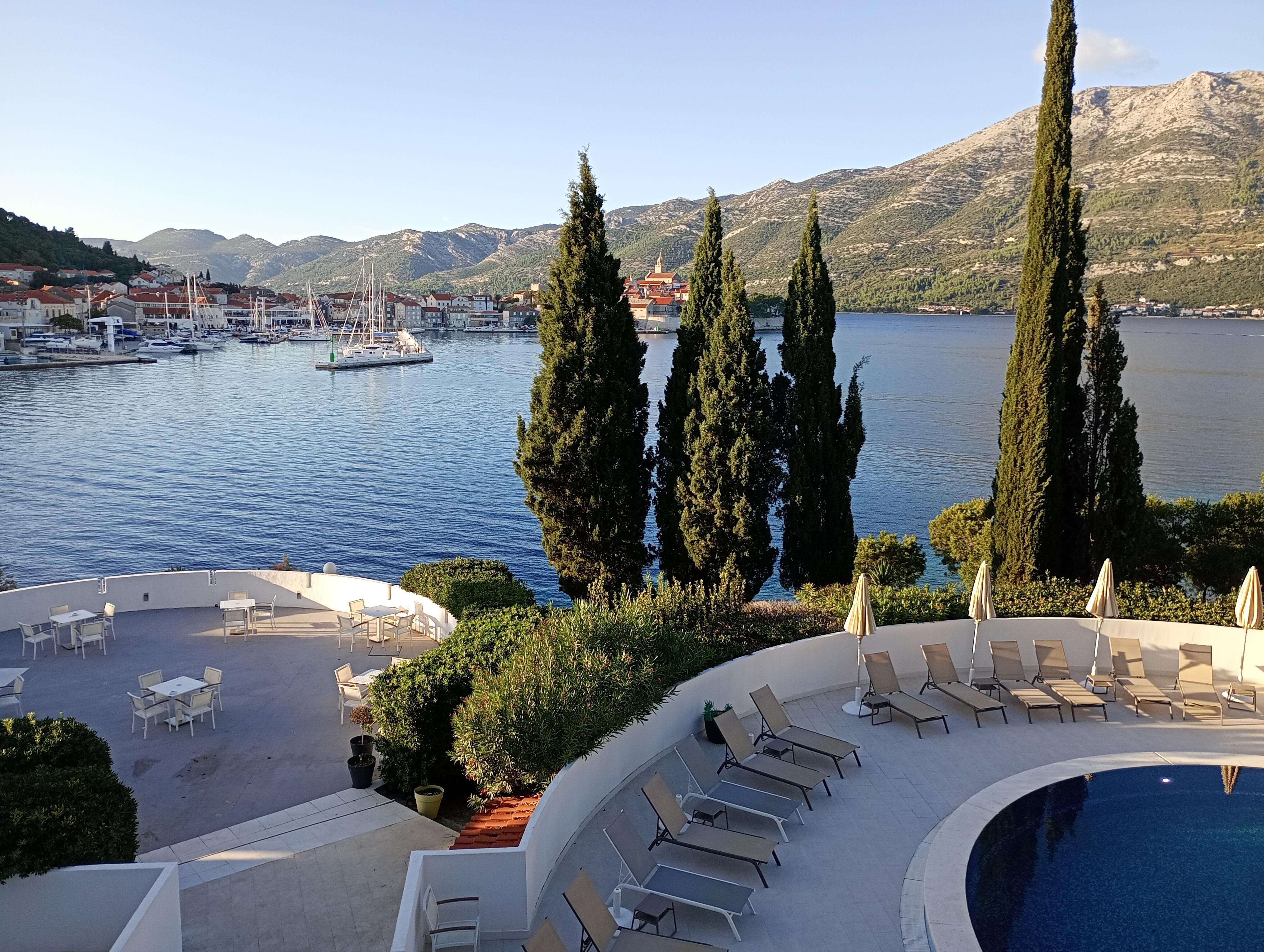 View from room over pool towards Korcula old town