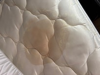 Bad stain on mattress. Room smelled bad