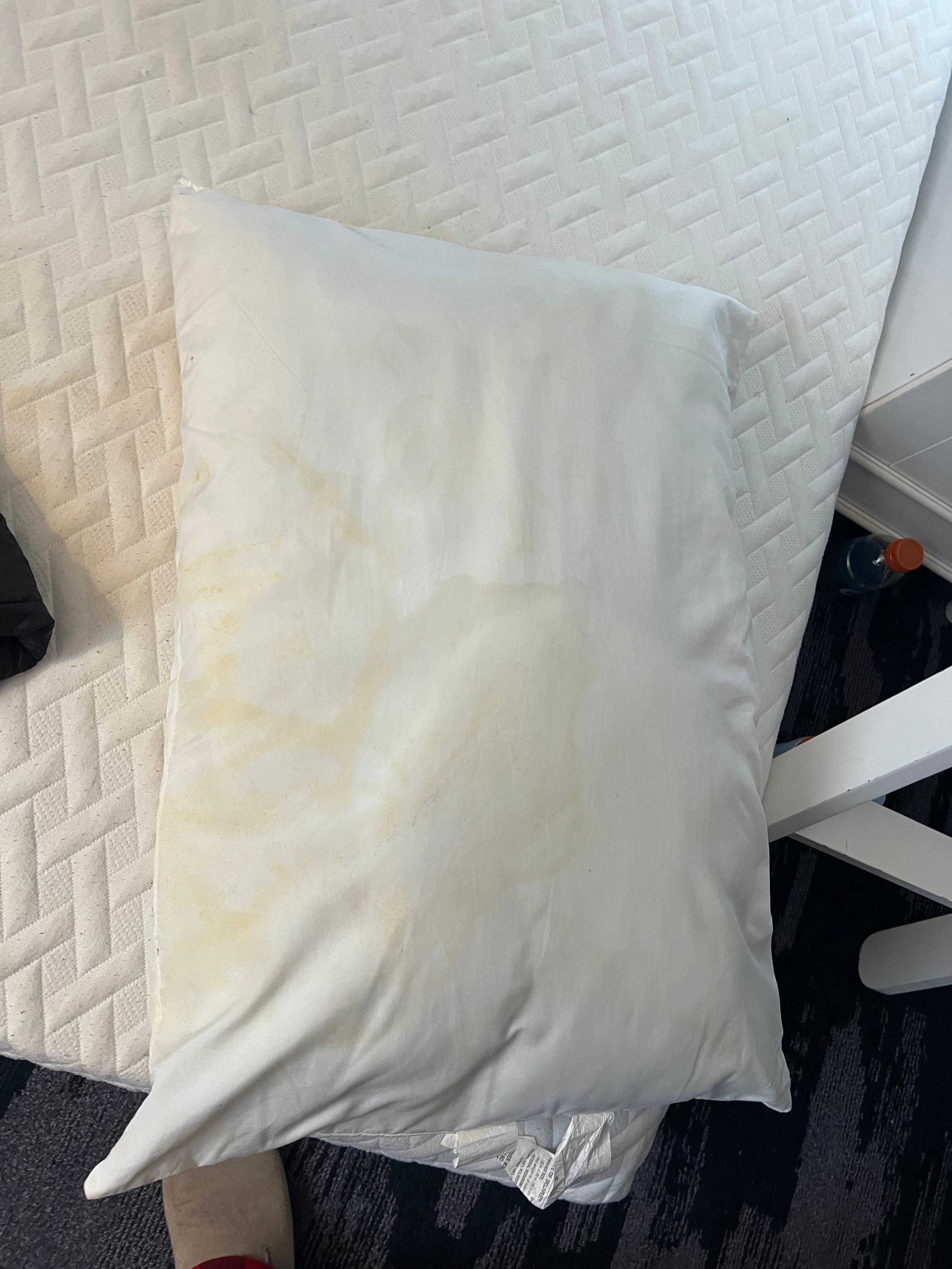 Most pillows are significantly stained. Master with large yellow stain on mattress.