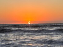 Picture of the sunrise from Sandbridge Beach ( a 5 minute walk from the house